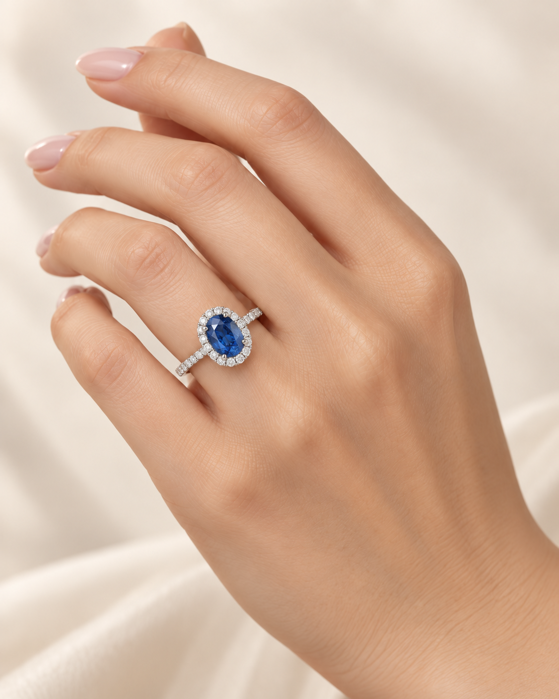 Oval Blue Sapphire Halo Diamond Ring