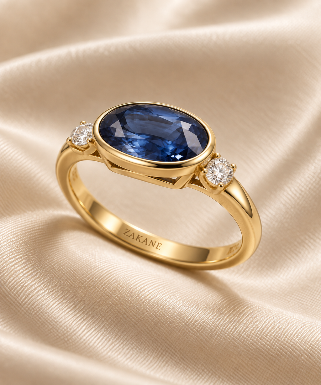 Oval Blue Sapphire Three-Stone Ring